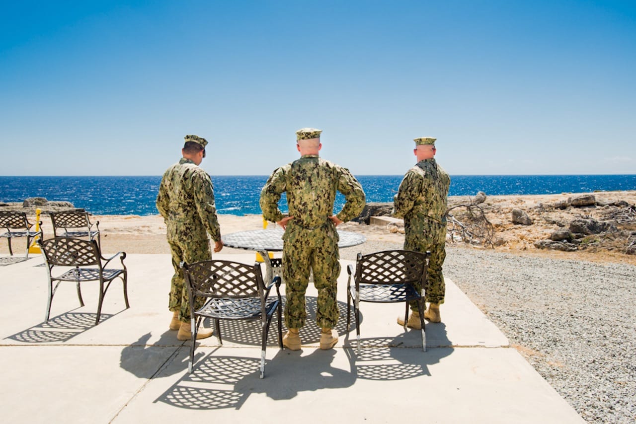 Debi Cornwall, "Smoke Break, Camp America" ()