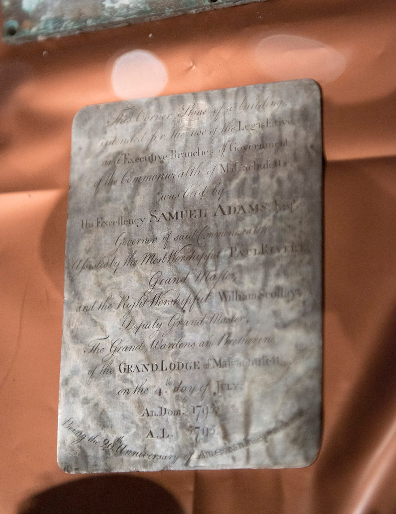 Contents of a time capsule found in the cornerstone of the Massachusetts State House building and undergoing examination and conservation work at the Museum of Fine Arts, Boston. January 6, 2015 (Photo courtesy of Museum of Fine Arts, Boston)