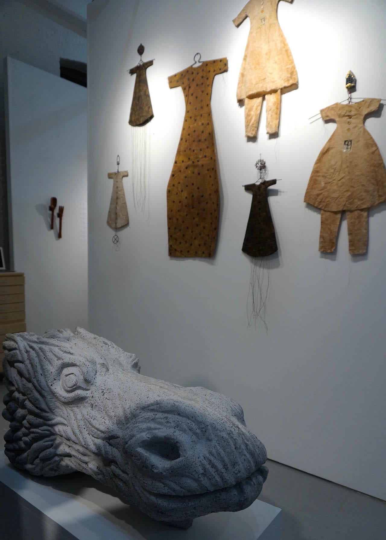 Work by Jerry the Marble Faun in the foreground and Larry Calkins in the background, at Jackie Klempay