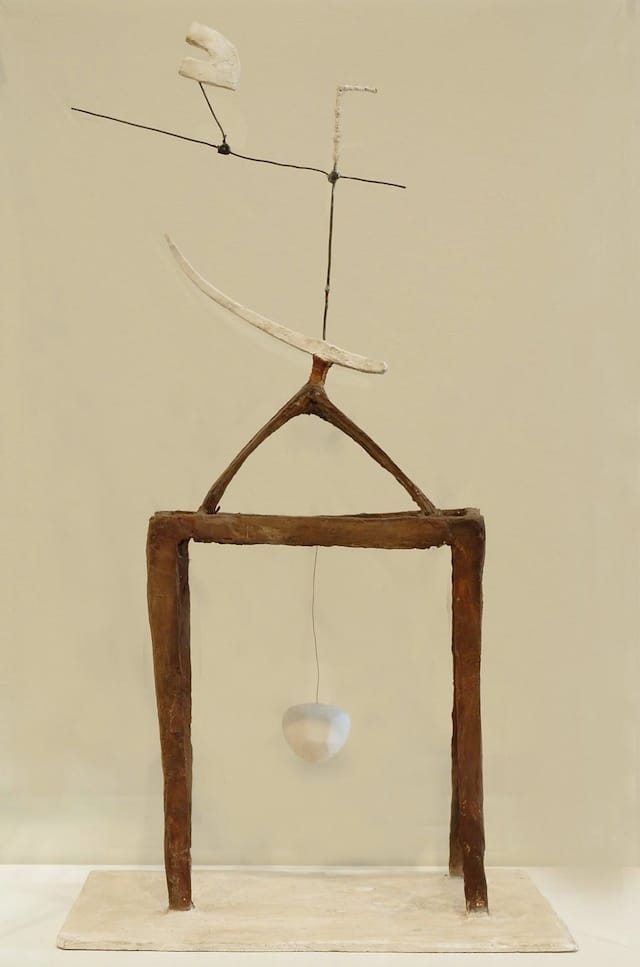 Alberto Giacometti, "Hour of the Races" (1930): "A picture of a flower on a glass table, or possibly a black and white vase on a wall with a plant. It stirs up a memory of a vase sitting on top of a wooden roof."