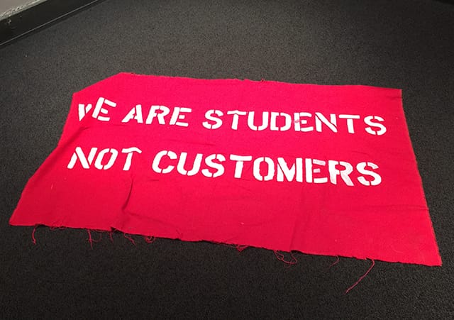 A banner on the floor of the Great Hall.