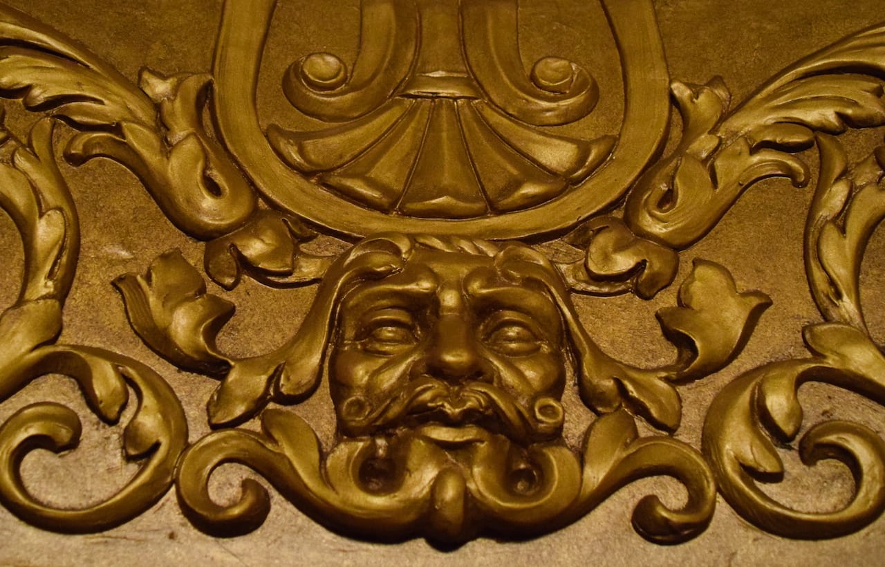 The walls and ceilings of the Kings Theatre are full of faces