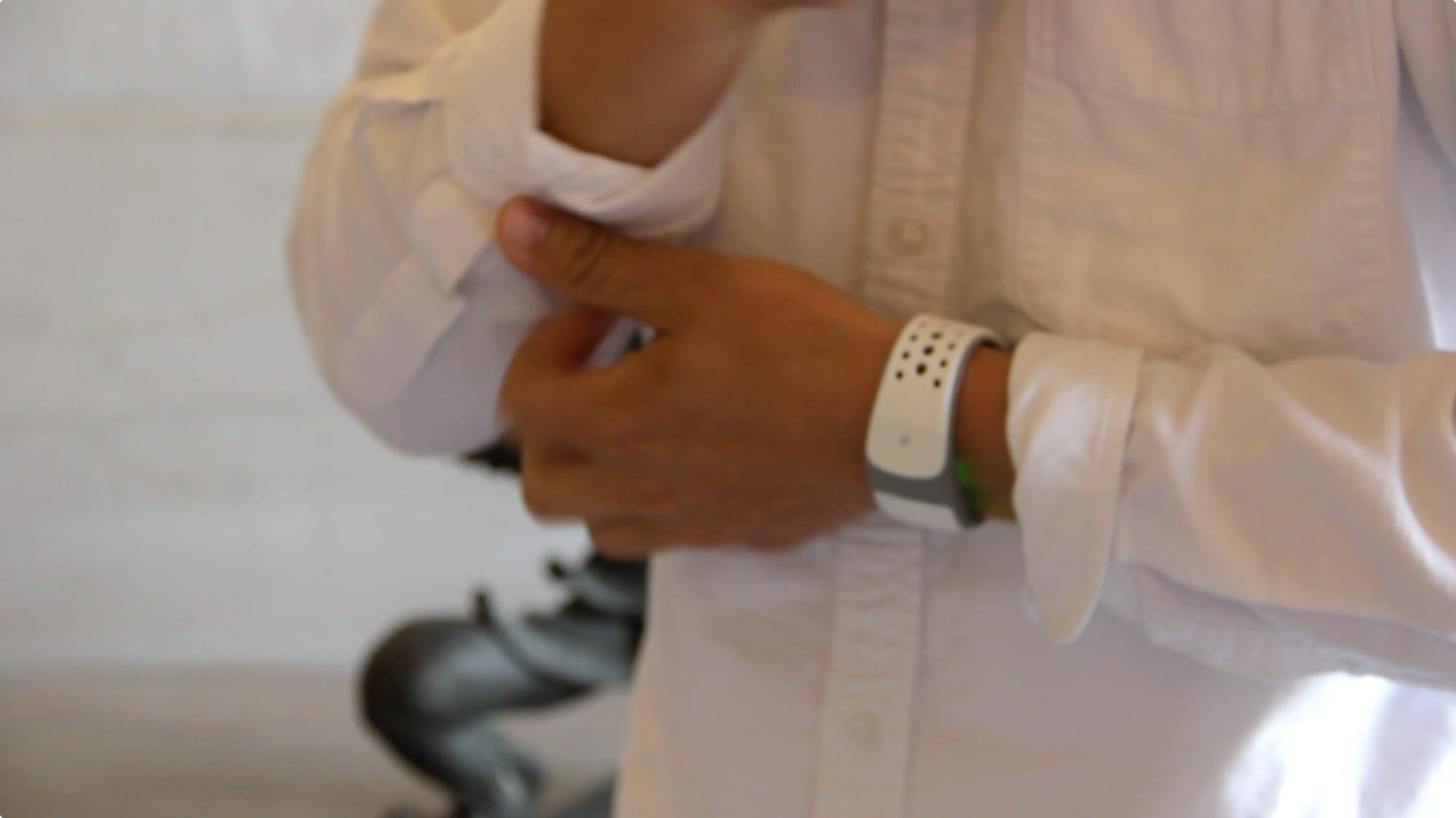 A test subject using the pplkpr heart-rate band, courtesy of the artists.
