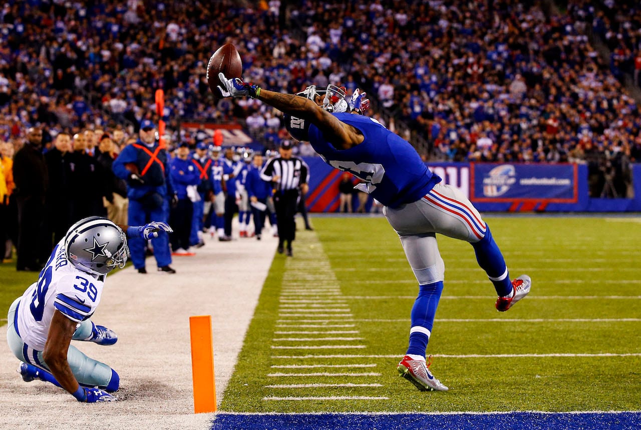 Second Prize Sports Category, Singles Al Bello, USA, Getty Images East Rutherford, New Jersey, USA Odell Beckham (#13) of the New York Giants makes a one-handed touchdown catch in the second quarter against the Dallas Cowboys at MetLife Stadium.