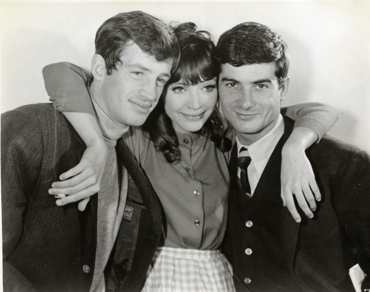 Jean-Paul Belmondo, Anna Karina, Jean-Claude Brialy. Still from director Jean-Luc Godard's A Woman Is a Woman. The Museum of Modern Art Film Stills Collection.