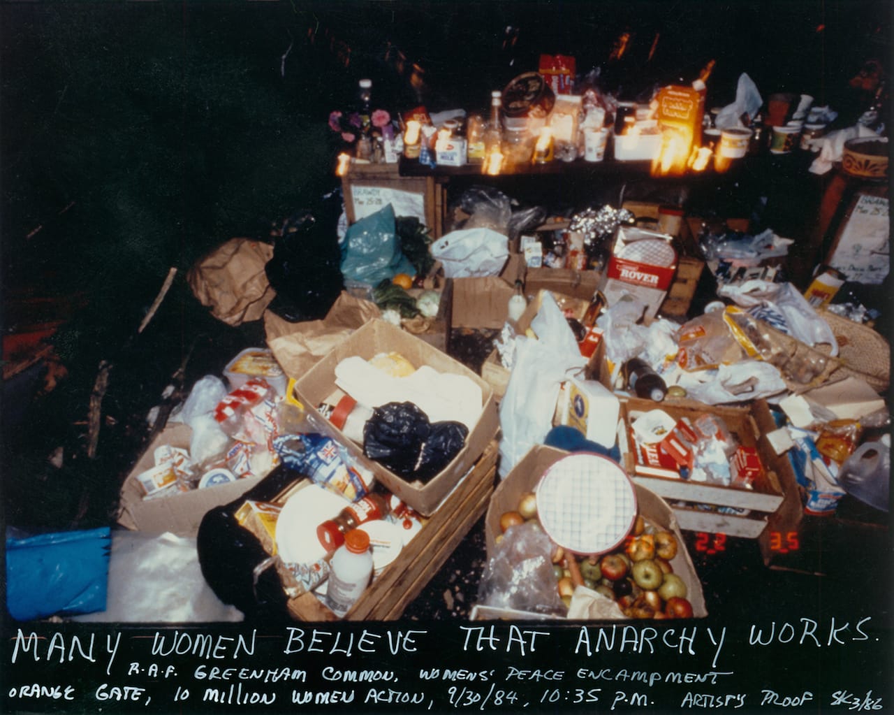 Susan Kleckner, "Untitled (Many Believe Anarchy Works...)", Greenham Common Silver Print Series (1984) (courtesy of the Susan Kleckner Archive, Special Collections and University Archives, W.E.B. DuBois Library, University of Massachusetts Amherst