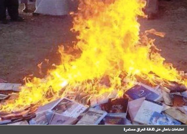 Book burning by ISIS militants (Image via Elaph) 