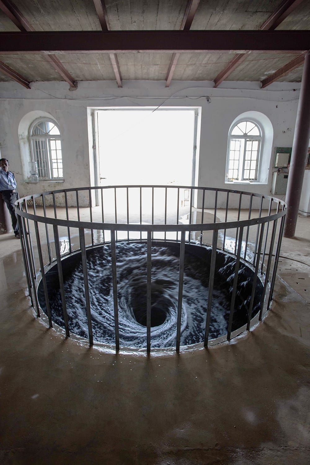 Artist Anish Kapoor's “Descension” (2014) project at the Kochi Biennial is a perpetual whirlpool, and the images are impressive. (©Anish Kapoor 2015, via Colossal)