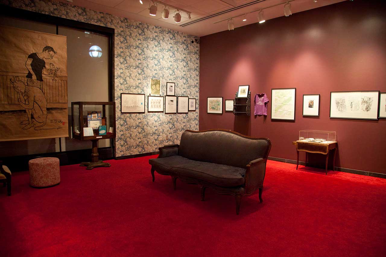 Installation view, 'Dykes, Dads, and Moms to Watch Out For: The Comics of Alison Bechdel' at the UM Institute for the Humanities Gallery