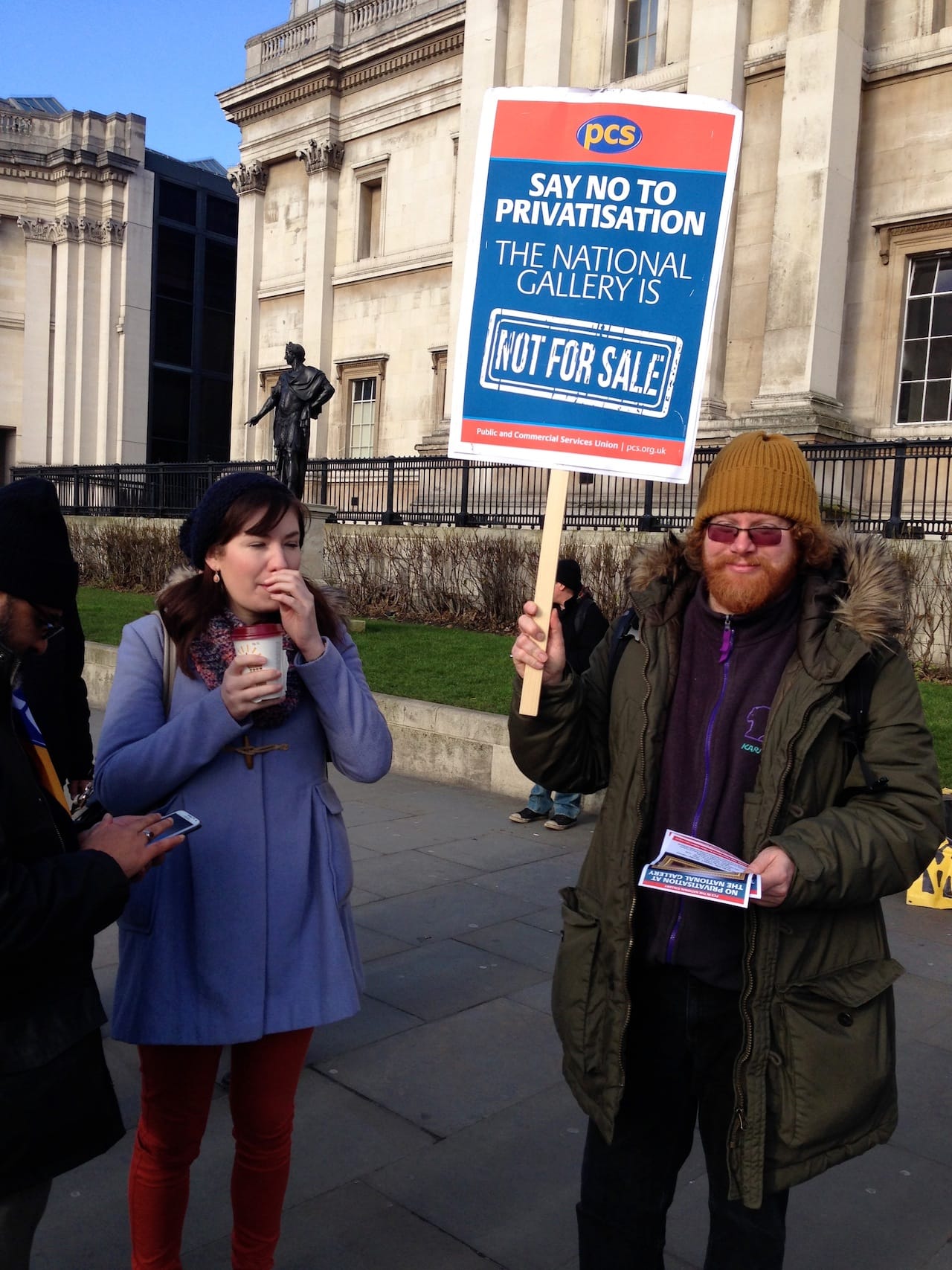 A picketer outside the National Gallery 