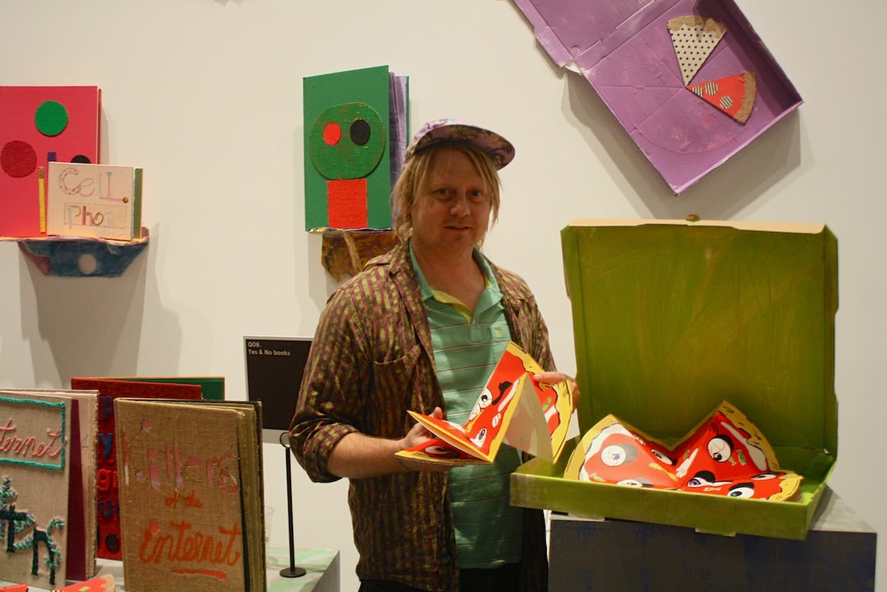 Edgar Bryan of Yes & No Books offers me a slice.