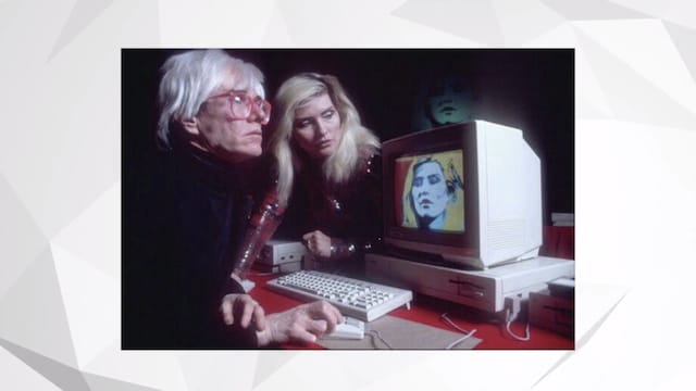 Andy Warhol at a computer (Screen grab via Vimeo) 