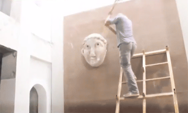 Members of ISIS destroying ancient statues in the Mosul Museum (animated gif by Hrag Vartanian for Hyperallergic)