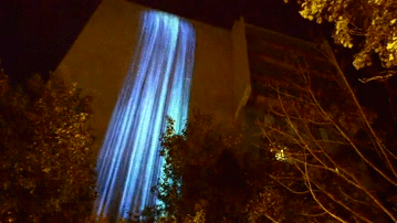 "Particle Falls" projected in Detroit (gif by the author via Vimeo)