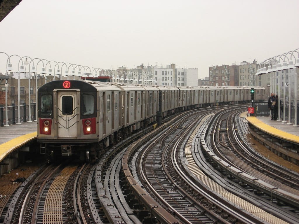 A 2 train on the elevated tracks in the Bronx in 2007 (photograph by Adam E. Moreira, via Wikimedia)