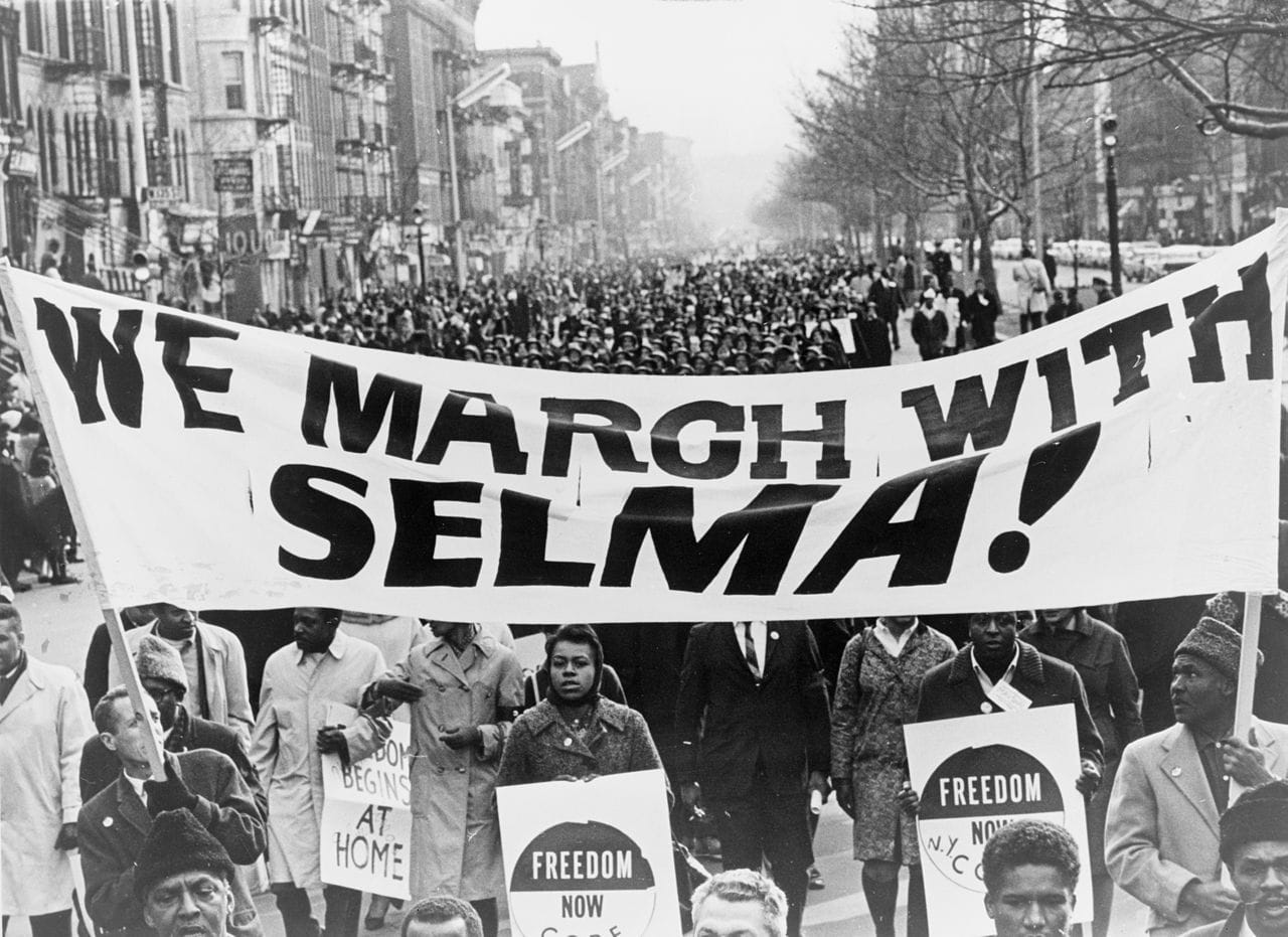 Marchers carrying a "We march with Selma" banner in Harlem following March 7, 1965's "Bloody Sunday" (March 15, 1965) (photograph by Stanley Wolfson, New York World Telegram & Sun, via Library of Congress)