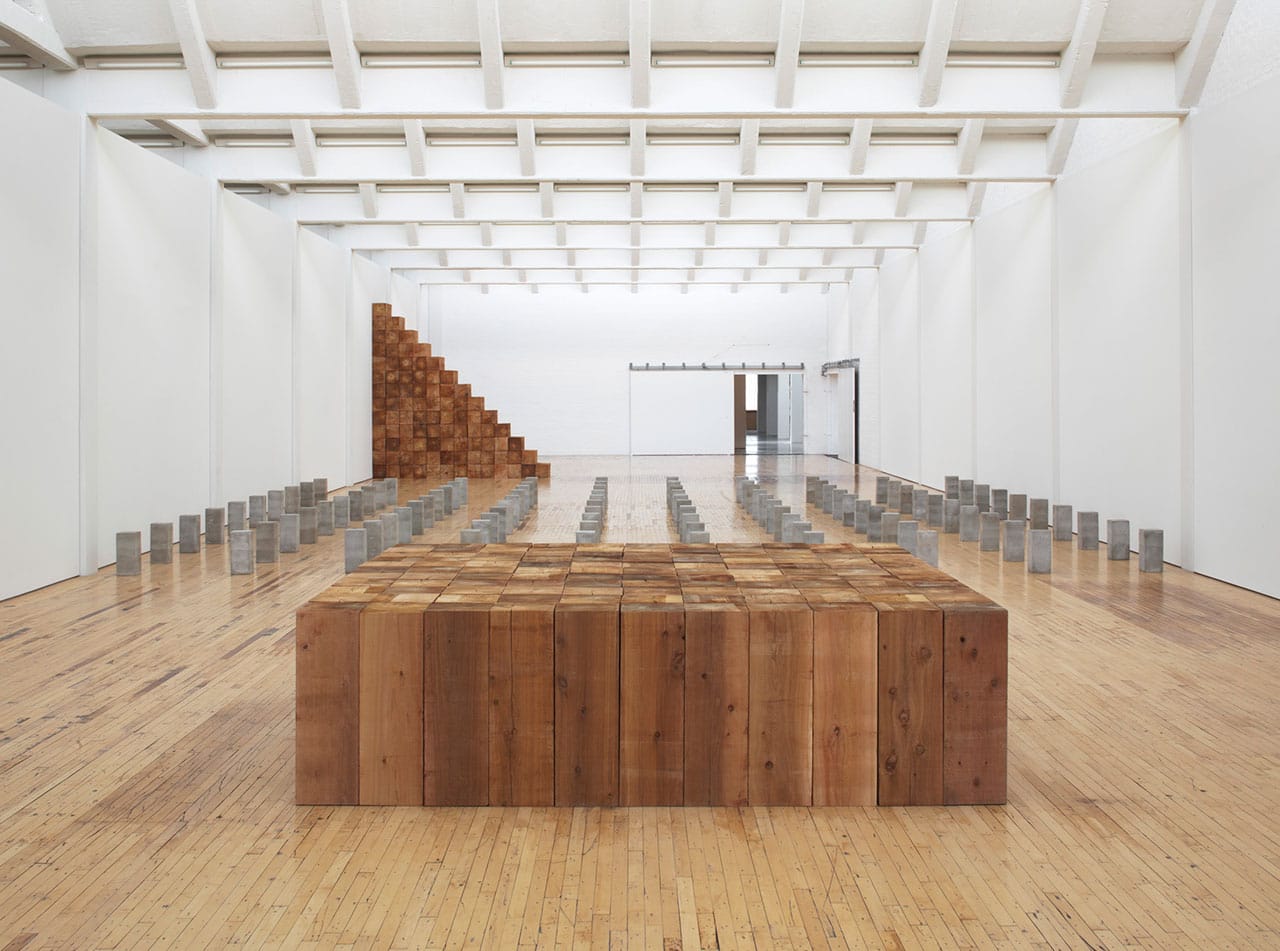 Installation view, 'Carl Andre: Sculpture as Place, 1958–2010,' showing "Fermi" (1979) and "Lament for the Children" (1976, destroyed, 1996 remade)