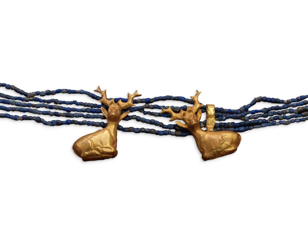 Detail of Puabi's headdress, bearded stag amulets (courtesy Institute for the Study of the Ancient World)