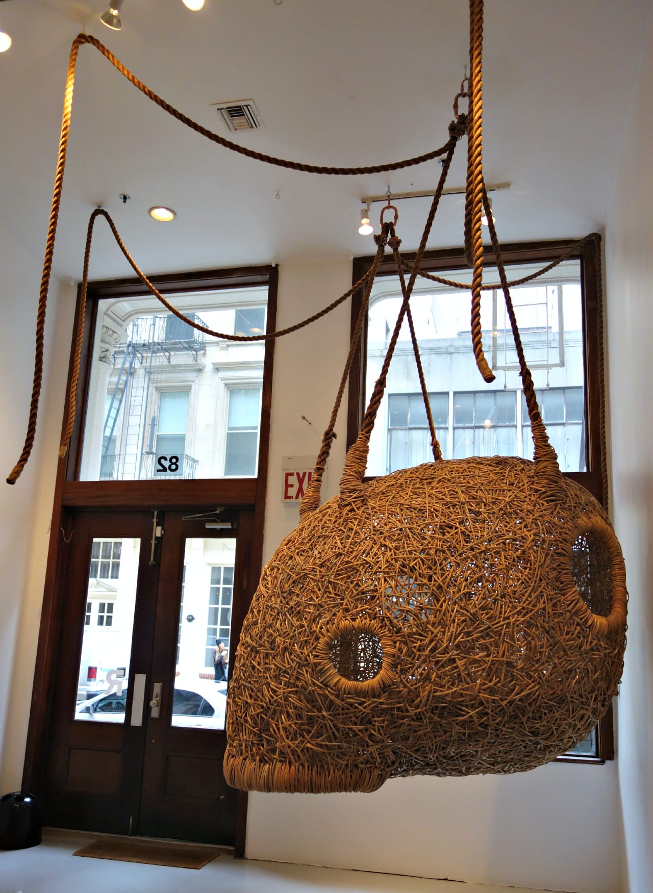 Custom hanging "Nest" sculpture by Porky Hefer (2014), made from woven cane with metal framing & jute ropes