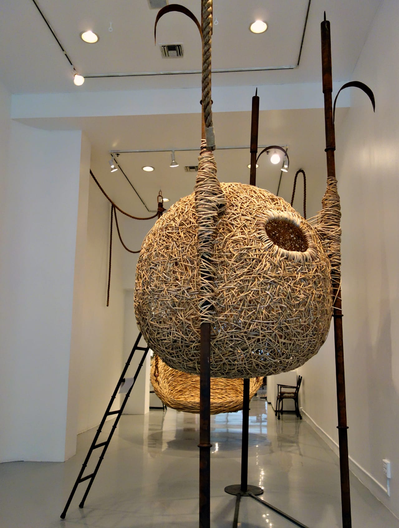 Custom hanging "Nest" sculptures by Porky Hefer, made from woven cane with metal framing & jute ropes