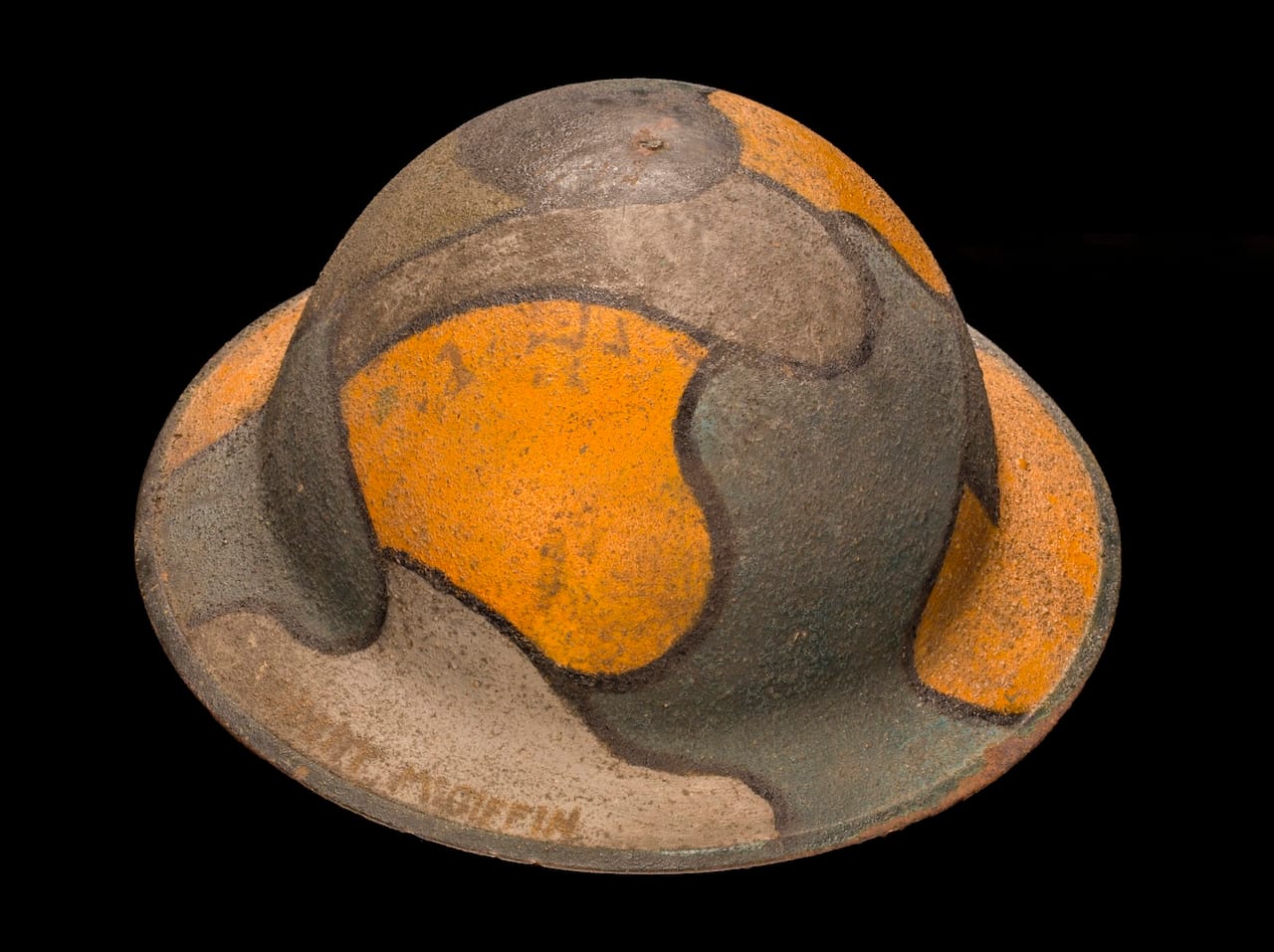 American Helmet Painted in Imitation of a German Camouflage Helmet. Ca. 1918. Robert McGiffin (American). Jane A. Kimball, Trench Art Collection