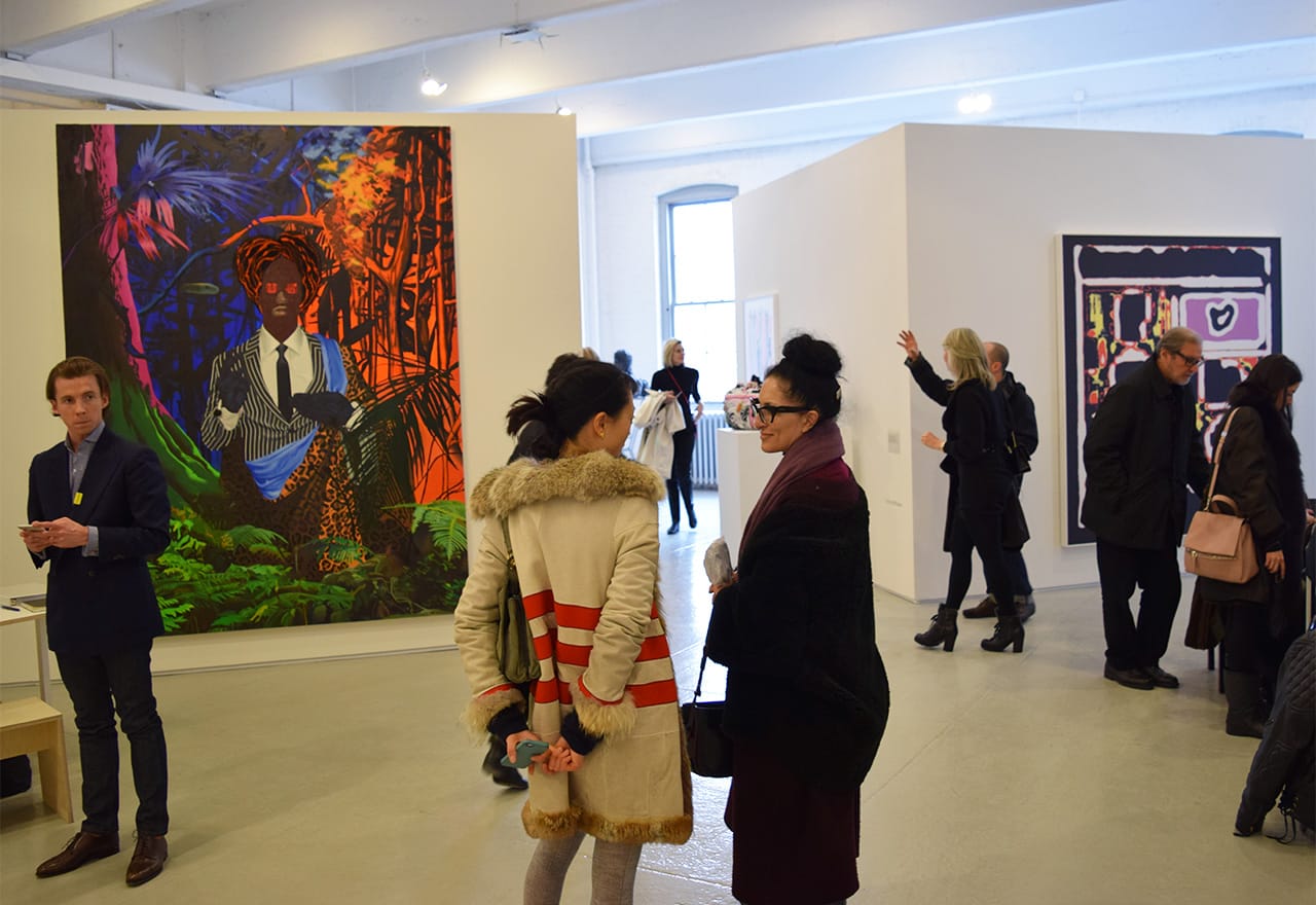 Crowds on the third floor of the Independent, with a large Jeff Sonhouse painting looming at left in the Tilton Gallery booth. (all photos by the author for Hyperallergic)