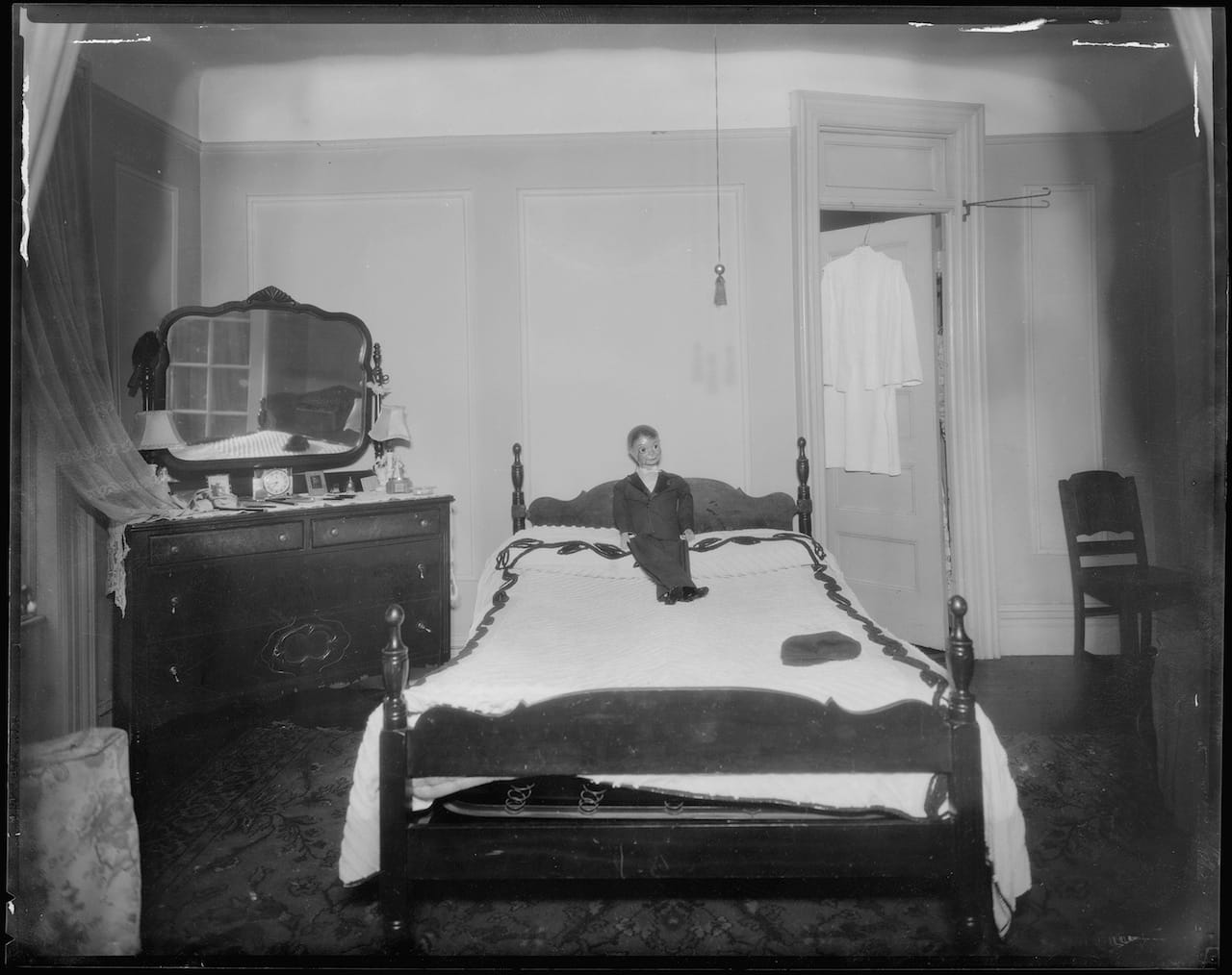 Doll on the bed of Virginia Bender at East 137th Street in the Bronx. It was here where she was found dead from apparent strangulation & stabbing (June 1939) (courtesy New York City Municipal Archives)