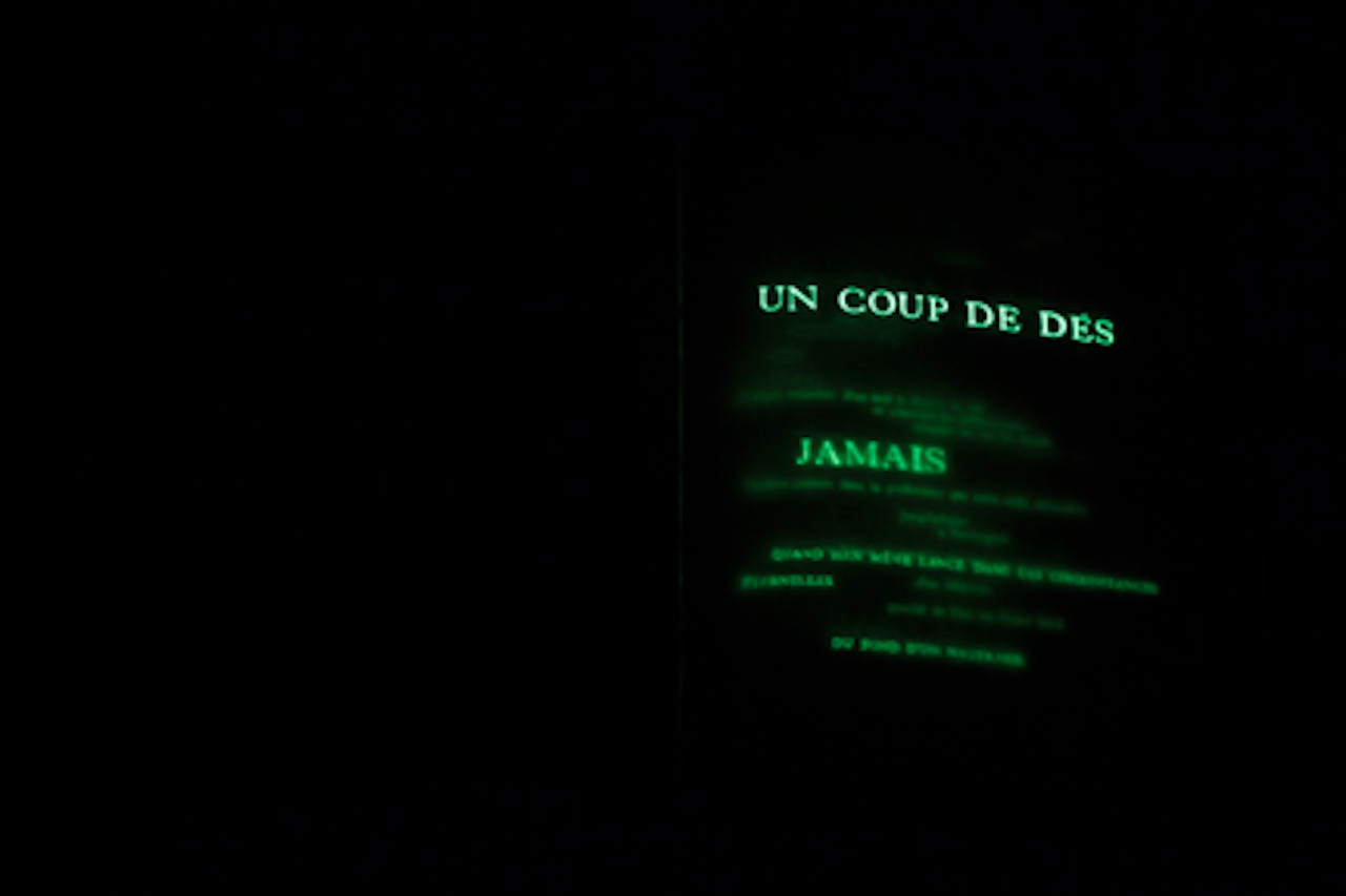 Raffaella della Olga, “Un coup de dés jamais n’abolira le hasard – constellation” (2009) based on the symbolist poem Un coup de dés jamais n’abolira le hasard (A Throw of the Dice will Never Abolish Chance) by Stéphane Mallarmé, éd. Gallimard, 1914, 35 x 50 cm, acrylic white paint and fluorescent powder © Raffaellea della Olga