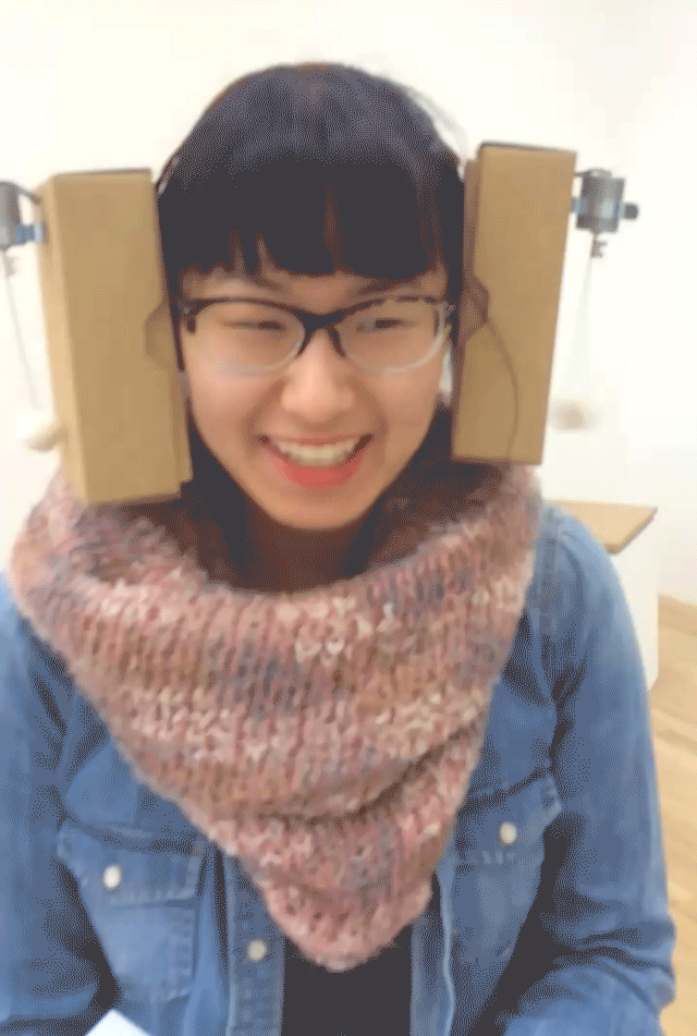 Zimoun, "2-prepared dc-motors, cotton balls, cardboard boxes 16.5x12x5cm" (2013), motors, steel, cardboard, felt, battery (gif by author for Hyperallergic)