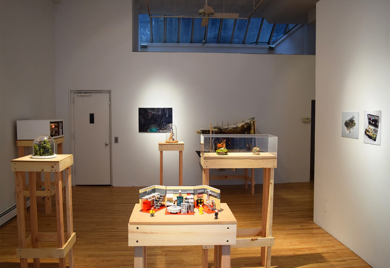 Installation view of 'Feel Big Live Small' at apexart