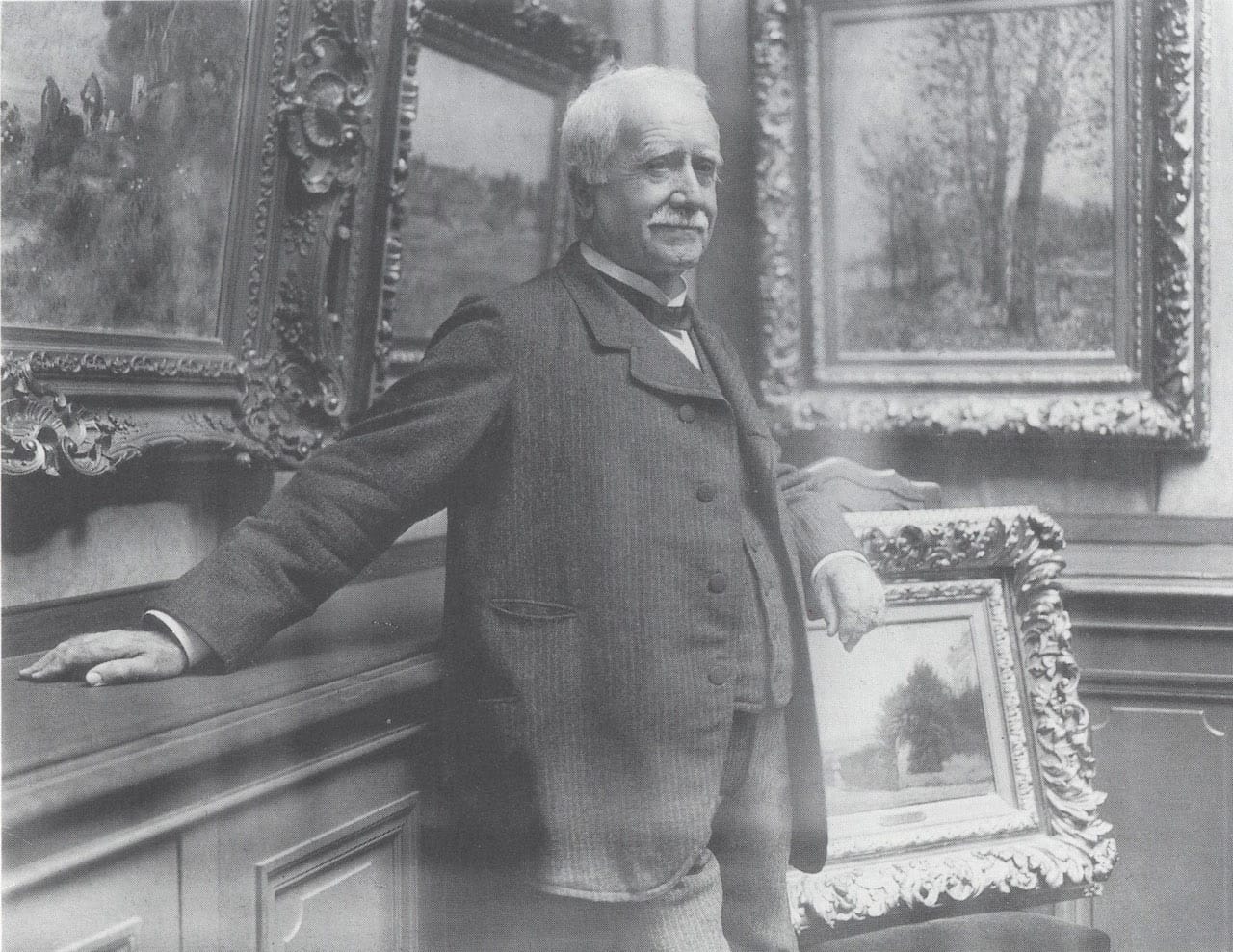 Photograph of Paul Durand-Ruel in his gallery, taken by Dornac, about 1910 