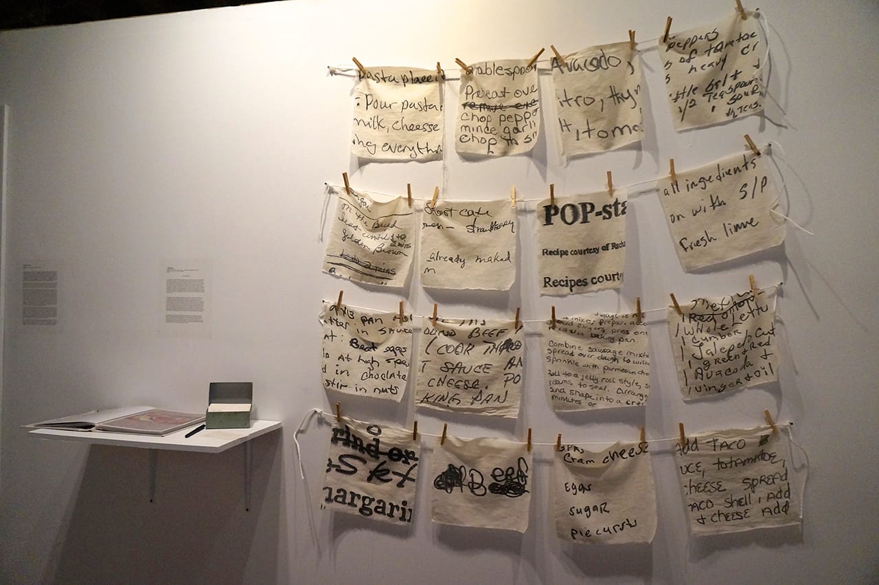 Julia Rooney, "THE RECIPE BOX" (2015), ink painted on cotton fabric, installed with clothespin and twine, 12" x 12" each