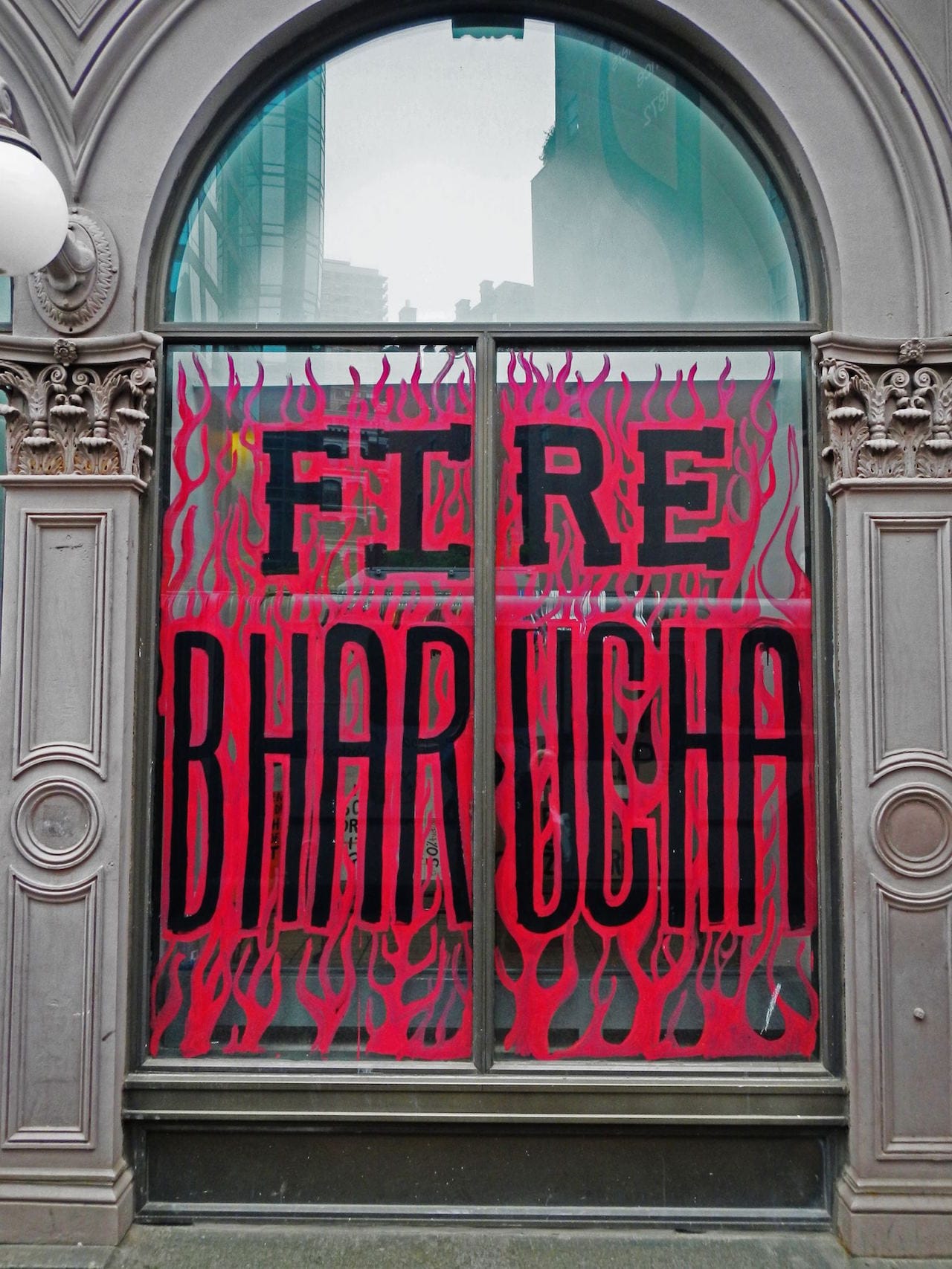 A message painted on a window of Cooper Union's Foundation Building in April 2013. (courtesy Free Cooper Union)