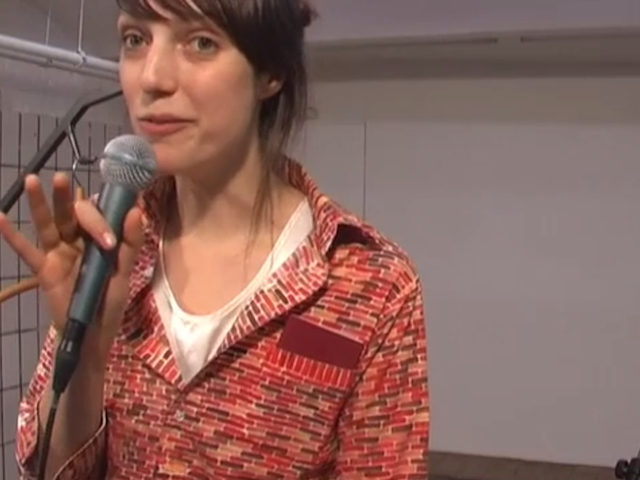 Kasia Fudakowski, "Smile" (2011). Film and documentation of performance at Chert Gallery 2011 with help from Christopher Fillipini, Tómas Lemarquis, Mathias Droste and Johannes Schroth. Used with permission from the artist.