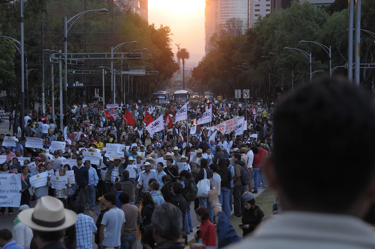 'Megamarcha' on Reforma avenue as the sun sets behind the Angel of Independence