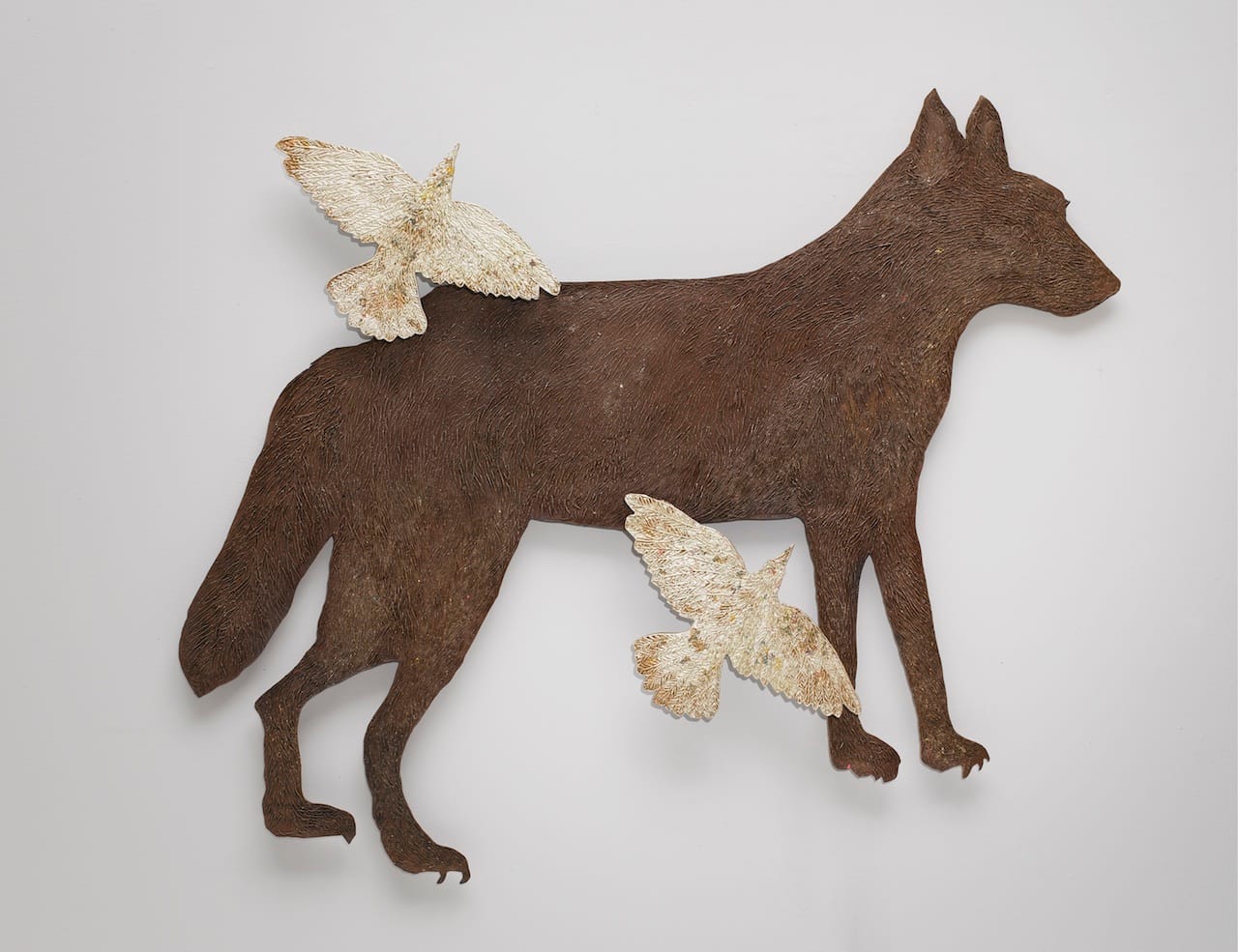 Kiki Smith, "Wolf with Birds III" (2010), bronze with gold leaf, 44 ½ x 54 x 2 ½ (Collection of Maria and Conrad Janis, Courtesy Pace Gallery)