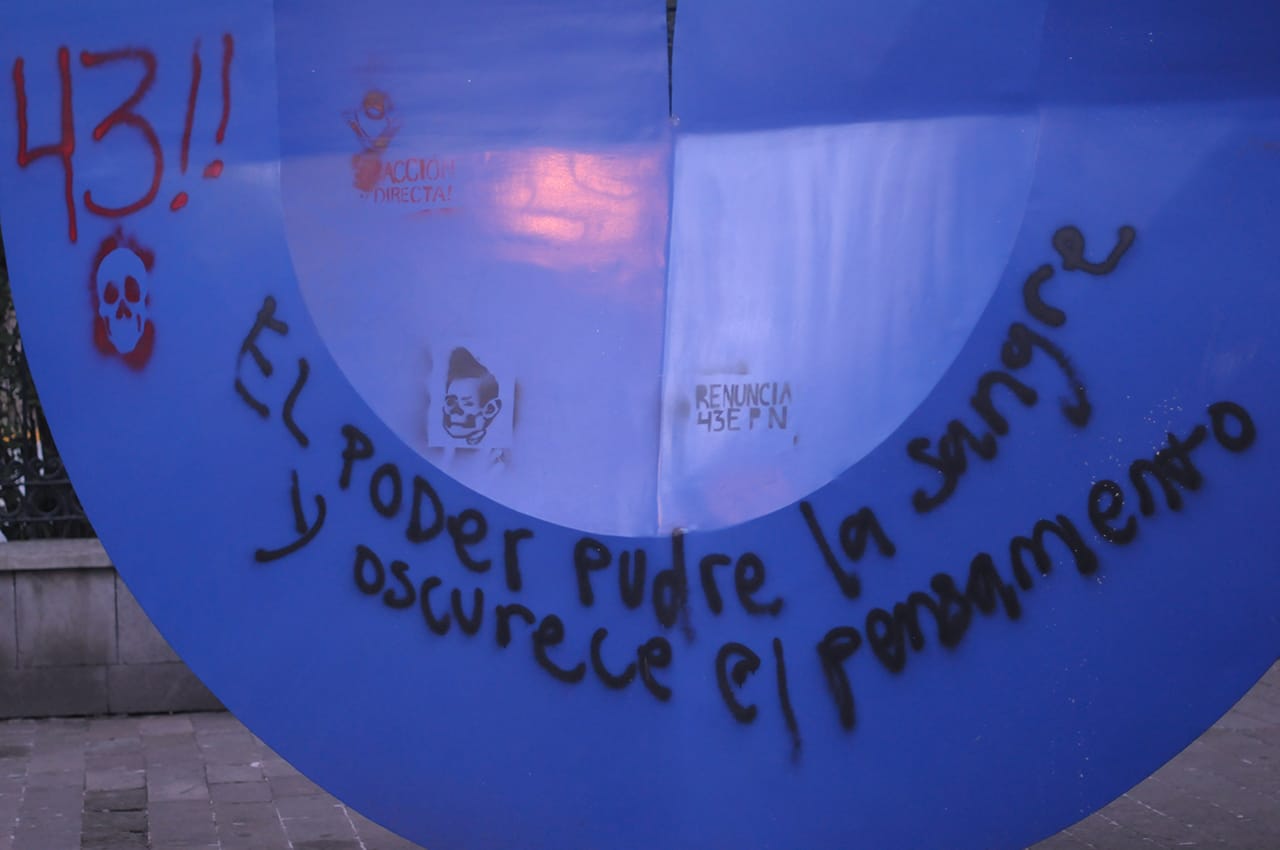 Detail of graffiti on a sculpture by Sebestián at the Museo de Arte Moderno