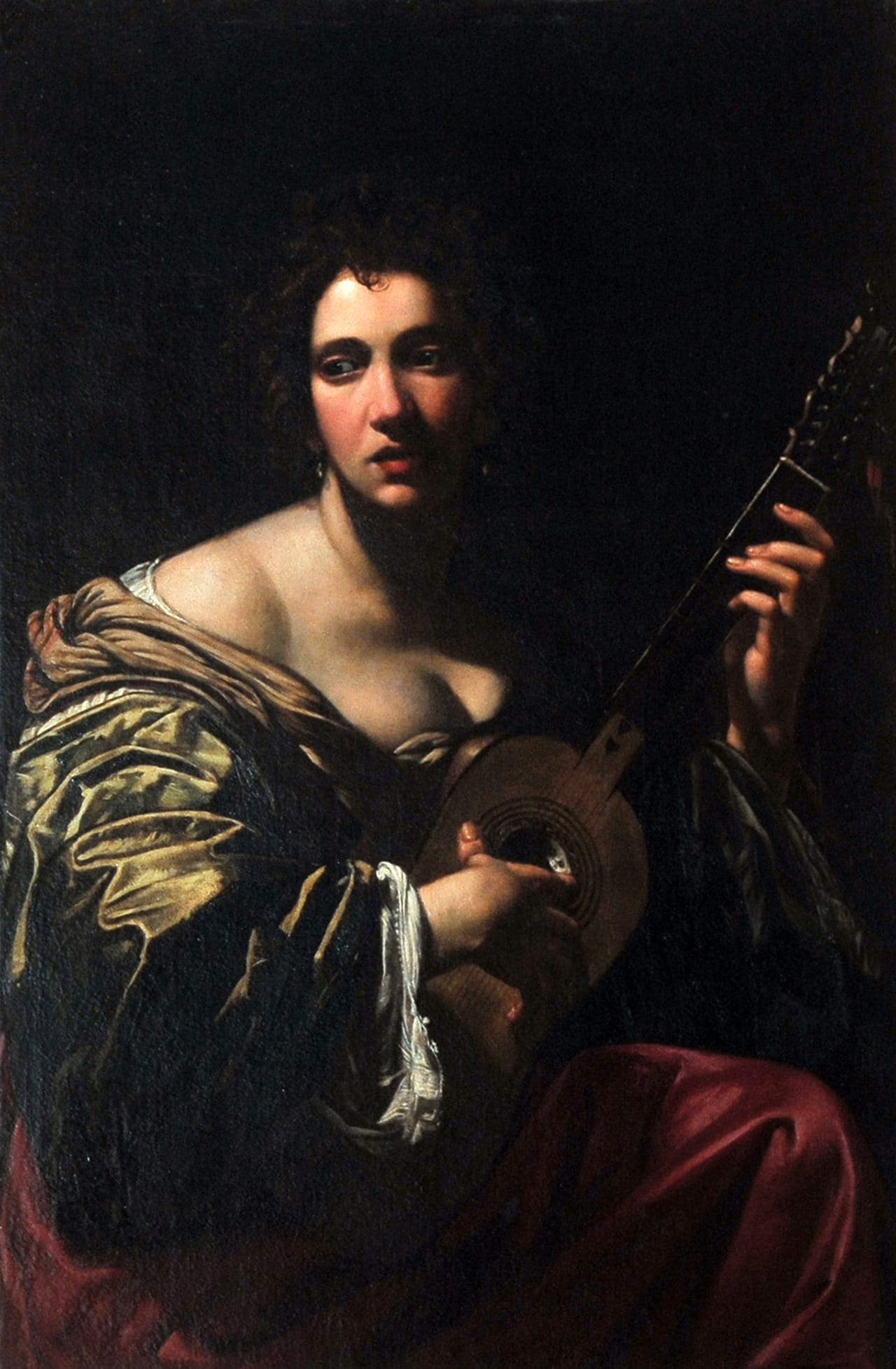 Simon Vouet, “Woman Playing Guitar” (circa 1618-1620) Oil on canvas, 107 x 75 cm © Private collection. Rome, collection of the Marquese Patrizi Naro Chigi Montoro