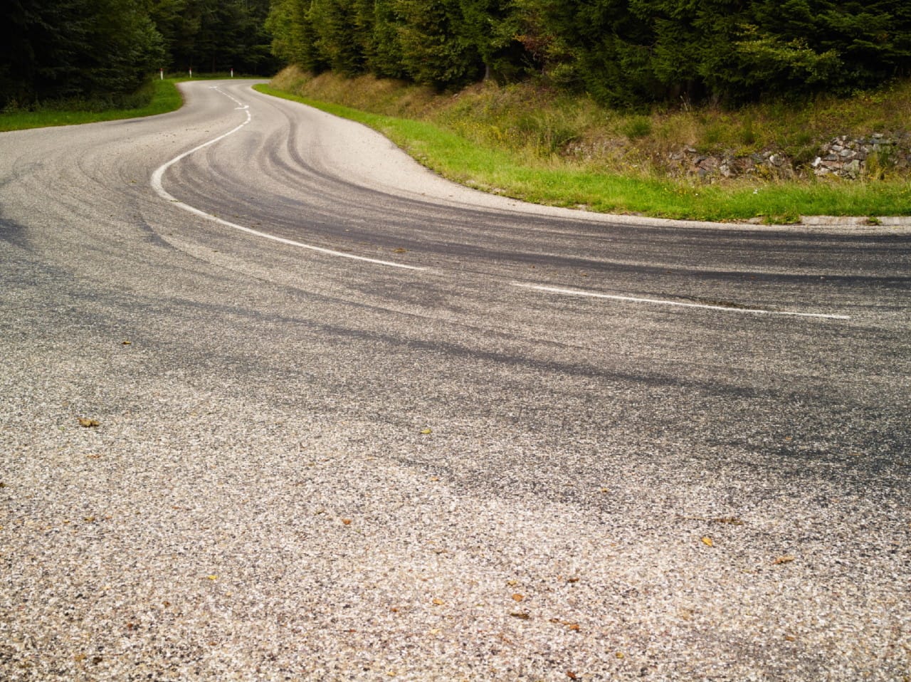 Jegor Zaika, "France, Natzwiller" (2013): Last curve on a mountain road before arriving to the Natzweiler-Struthof concentration camp.