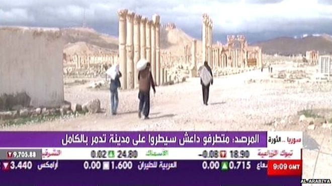 Pan-Arab TV channel Al-Arabiya showed residents leaving the city, carrying their possessions with them (via BBC)
