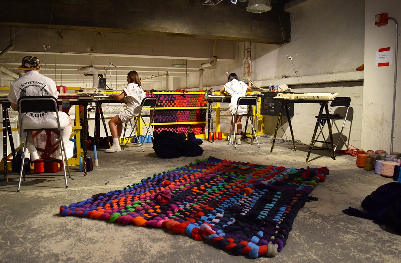 Textile workers in in Liz Collins's pop-up Knitting Nation studio at the Collective Design fair