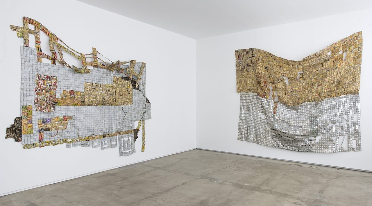 El Anatsui's "Ascension" (2014), left, and "Dissolving Dreams" (2014), both found aluminum and copper wire. (photo courtesy Jack Shaiman Gallery)