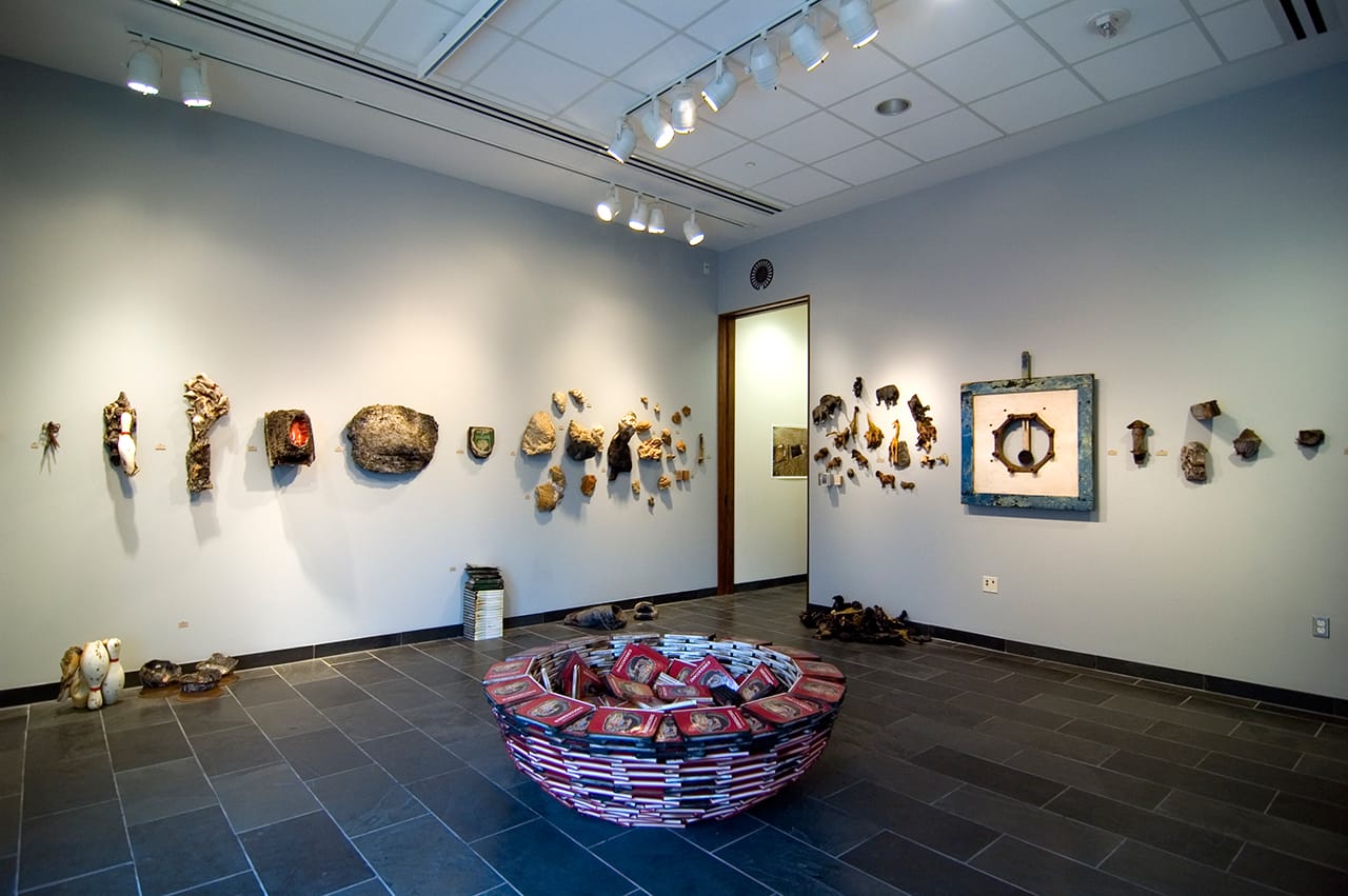 Hocking excavated and reassembled abandoned items within the former book depository for Detroit Public Schools, which left behind a particularly poignant set of damaged remains.