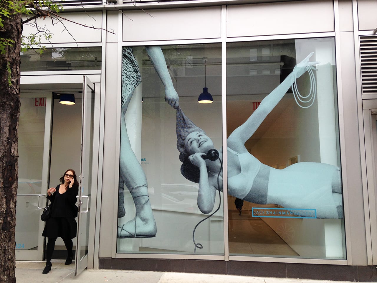 View of 'Hank Willis Thomas, Unbranded' from outside Jack Shainman Gallery's 24th Street space (all photos by the author for Hyperallergic unless otherwise noted)