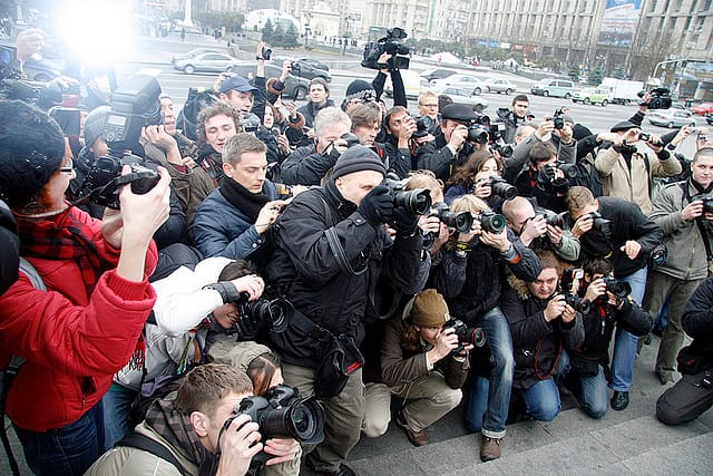 Photographers at a FEMEN demonstration (photo by Yaroslav Debelyi, via FEMEN Women's Movement/Flickr)