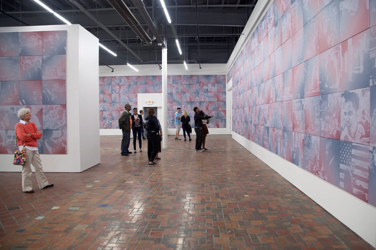 Viewers at the opening reception in the main gallery