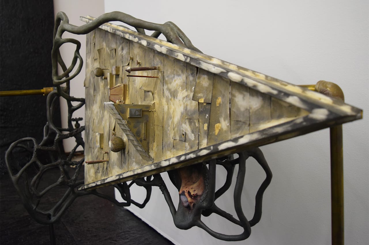 Detail of Dora Budor, "Slow Ticking of the Callous Mind" (2015), screen-used miniature rooftop from 'Batman Returns' (1992), steel armature, epoxy clay, infected silicone prosthetics, acrylic polymer with pigment suspension, sfx and weathering paint, and assorted metal hardware