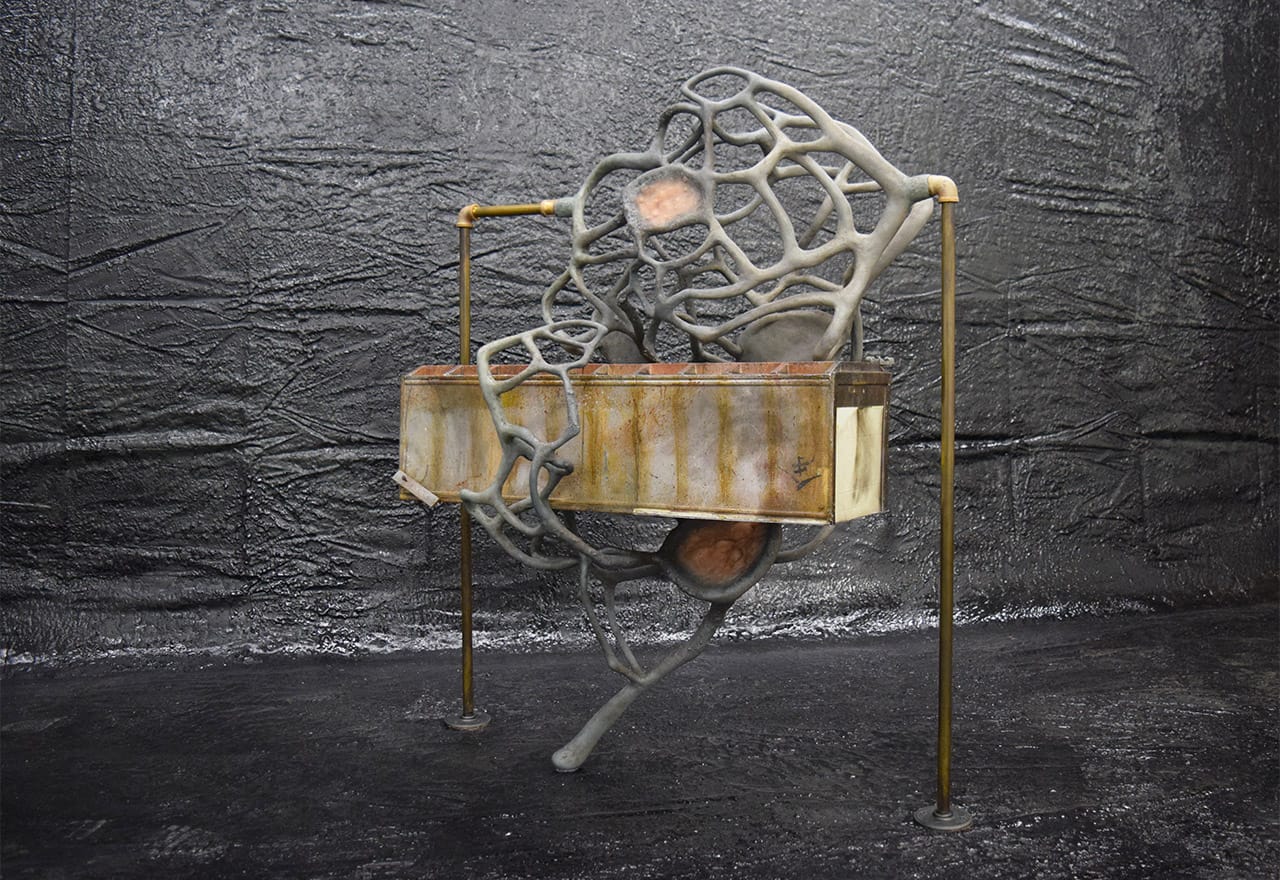 Dora Budor, "What Kind of Person Does This" (2015), screen-used miniature rooftop from 'Johnny Mnemonic' (1995), steel armature, epoxy clay, infected silicone prosthetics, acrylic polymer with pigment suspension, sfx and weathering  paint, and assorted metal hardware