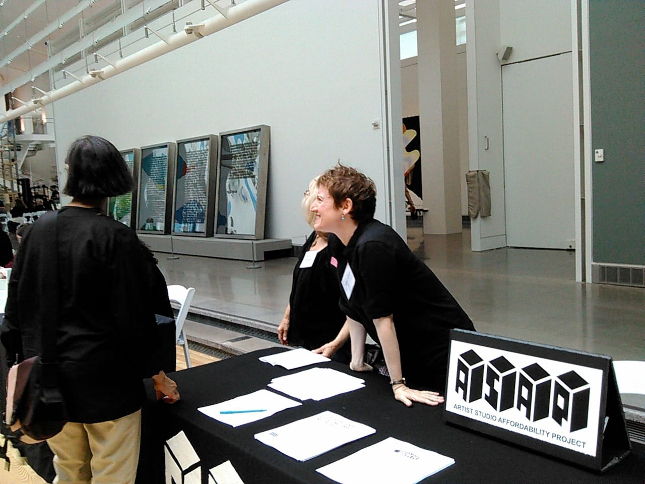 Jenny Dubnau in the resource center representing Artist Studio Affordability Project