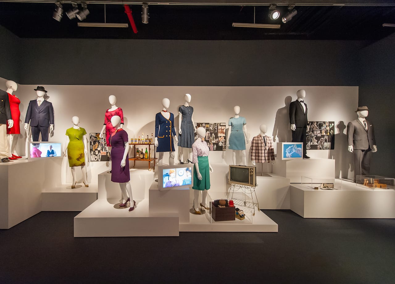 New York - March 10, 2015. At the Museum of the Moving Image press preview for the exhibition "Matthew Weiner's Mad Men." Installation view of "Creating Character" section, which features costumes and props for characters including Don Draper, Peggy Olson, Joan Holloway/Harris, Roger Sterling. (Not shown in this photo, but also included in the exhibition are costumes and props for Megan Draper, Betty Draper/Francis, Sally Draper, Pete Campbell, Henry Francis, two secretaries, and two of Megan's friends.) Photo: Thanassi Karageorgiou / Museum of the Moving Image.